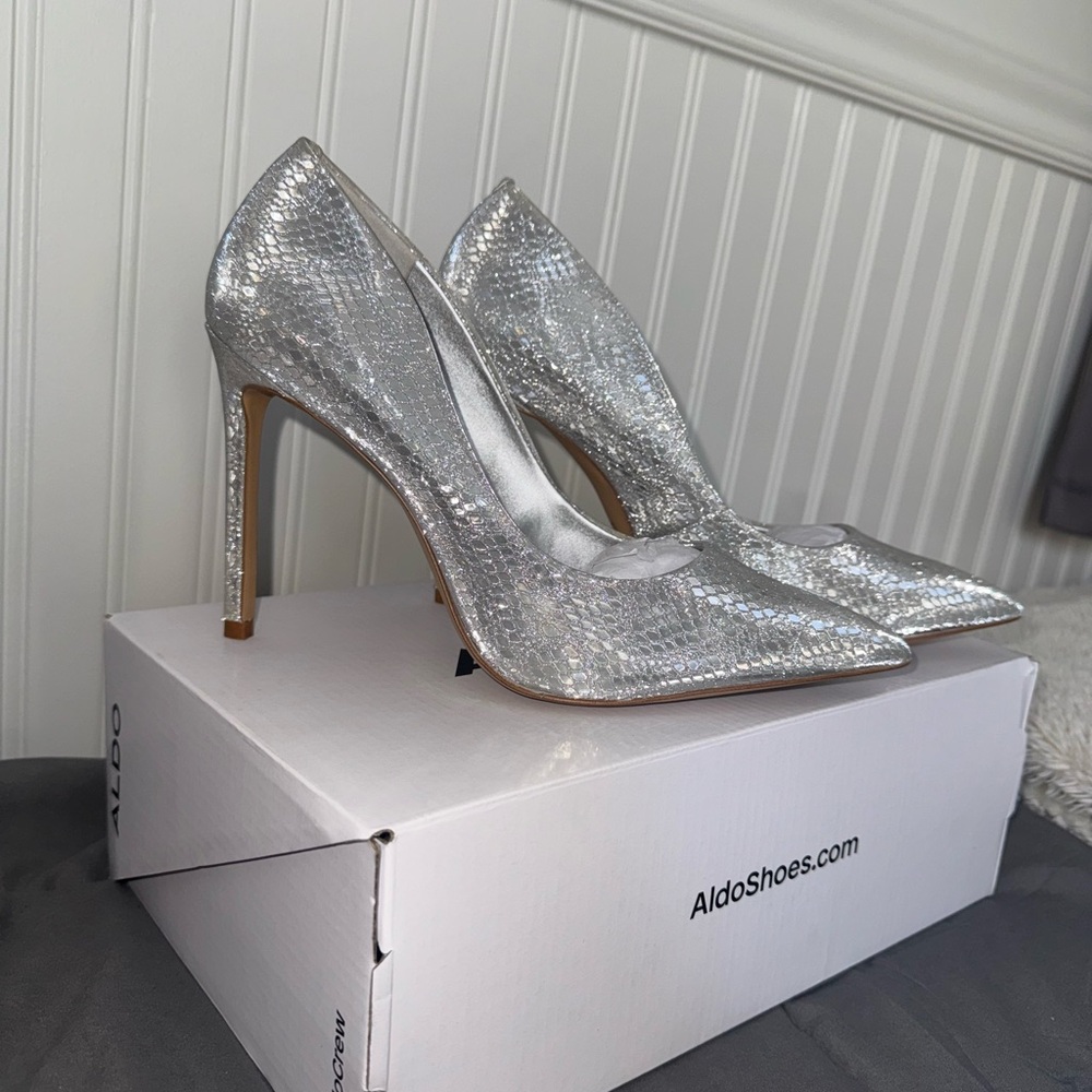 Brand new Aldo silver high heels